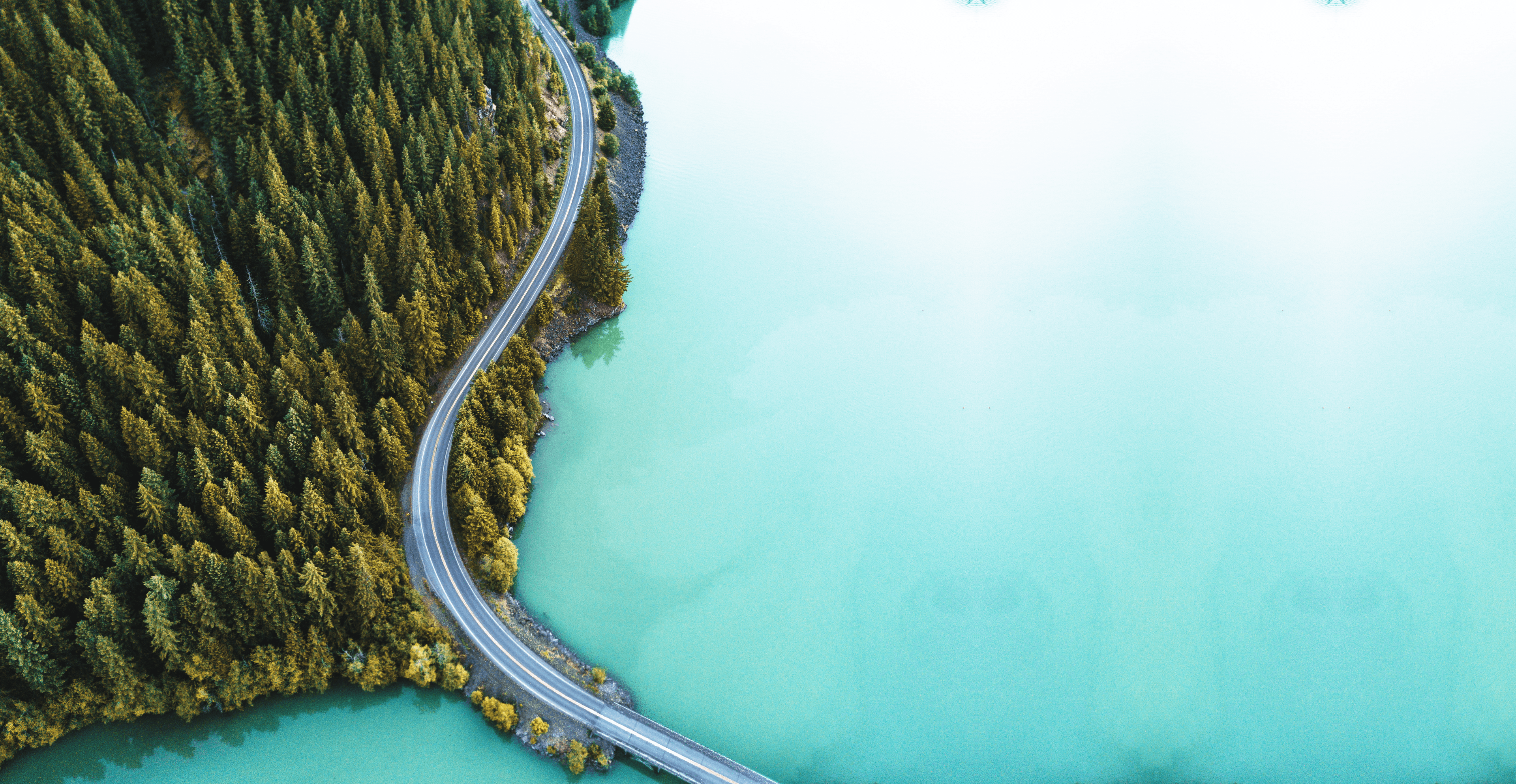 Infrastructure planning with roads, railways, and natural landscape